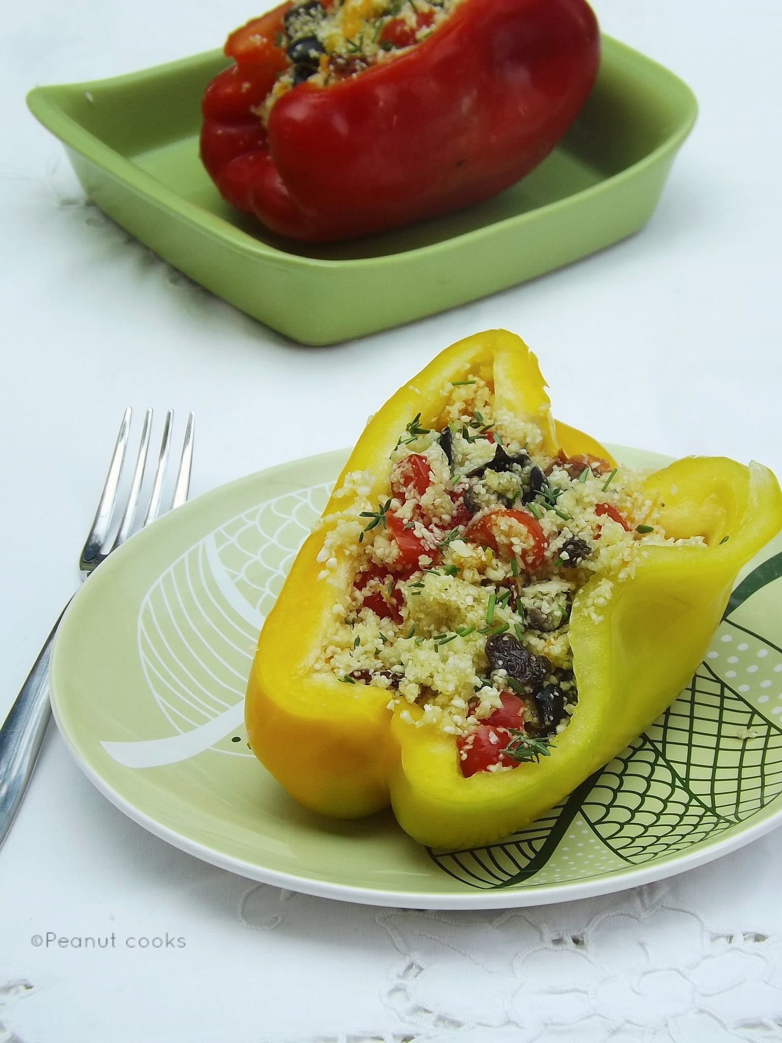 Raw cauliflower cous cous stuffed peppers