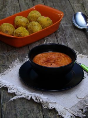 Raw carrot almond pulp balls with ketchup