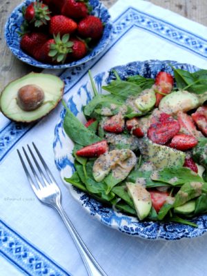 Spinach, strawberry and avocado salad with orange tahin dressing